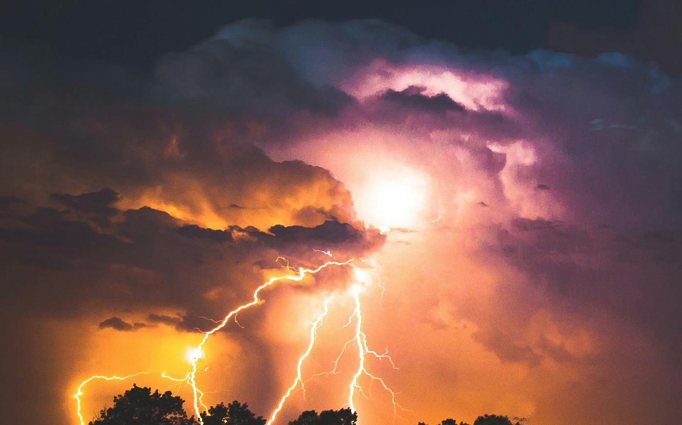 lightning strike at night by Max LaRochelle courtesy of Unsplash.