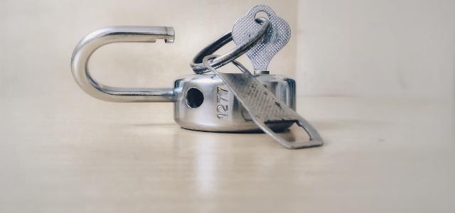 gray stainless steel padlock by Basil James courtesy of Unsplash.