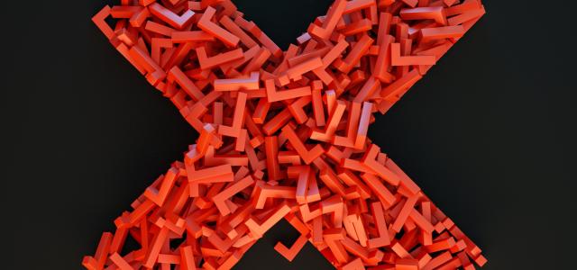 a cross made out of small pieces of red plastic by 愚木混株 cdd20 courtesy of Unsplash.
